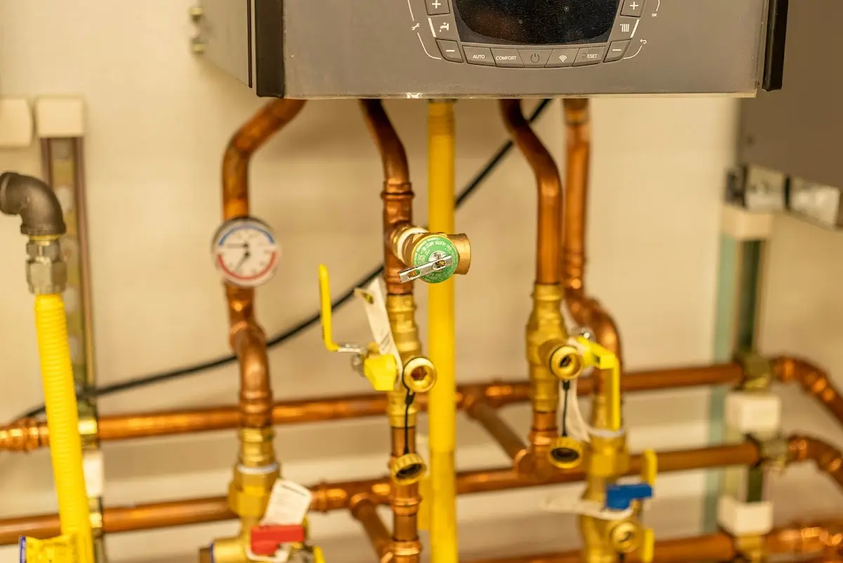 Licensed technician providing Water Heater Installation for a homeowner in Napoleon